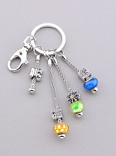 картинка Брелок 'Vogue'  Бижутерный сплав 9 см от магазина Wolves