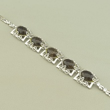 картинка Браслет на замке из медицинского сплава с раухтопазом от магазина Wolves