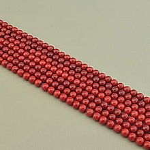 картинка Нитка Коралл 39 см 7 5 мм (Без замка) от магазина Wolves