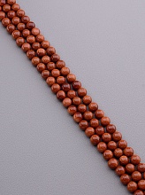 картинка Нитка Золотой Песок 38 см 8 мм от магазина Wolves