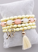 картинка Многослойный браслет из бусин молочного пластика с кисточкой 18 см от магазина Wolves