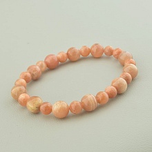 картинка Браслет оранжевый с солнечным камнем на резинке 'SUNSTONES' 18.5 см от магазина Wolves