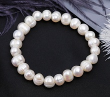 картинка Элитный Браслет Жемчуг белый на резинке от магазина Wolves
