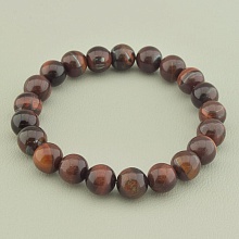 картинка Браслет из Бычьего глаза, коричневый, на резинке 'SUNSTONES' 19 см от магазина Wolves