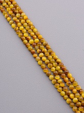 картинка Нитка Кошачий глаз 38 см 6 5 мм (Без замка) от магазина Wolves