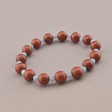 картинка Браслет коричневый из ангелита, яшмы на резинке 'SUNSTONES' 19 см от магазина Wolves