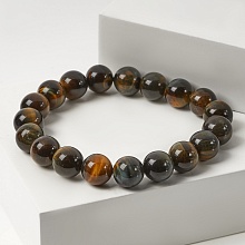 картинка Элитный Браслет Соколиный глаз на резинке от магазина Wolves