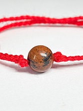 картинка Оберег Красная нить с камнем Обсидиан от магазина Wolves